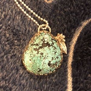 Turquoise and silver pendant